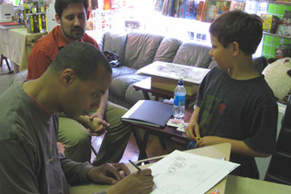 dave marshall showing kids how to draw comics